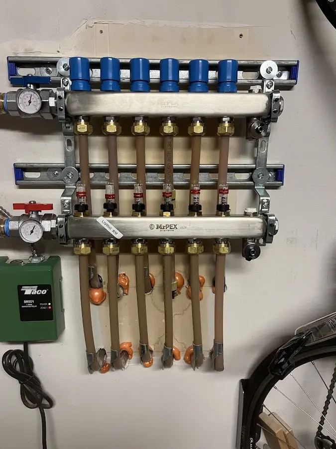 Plumber performing Water Heater Repair at a residential property in Palm Tree